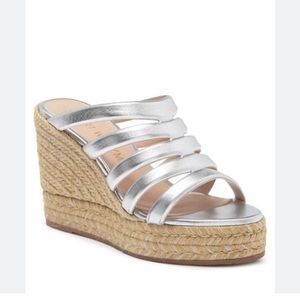 Stuart Weitzman Lilyana silver wedges. Never worn.